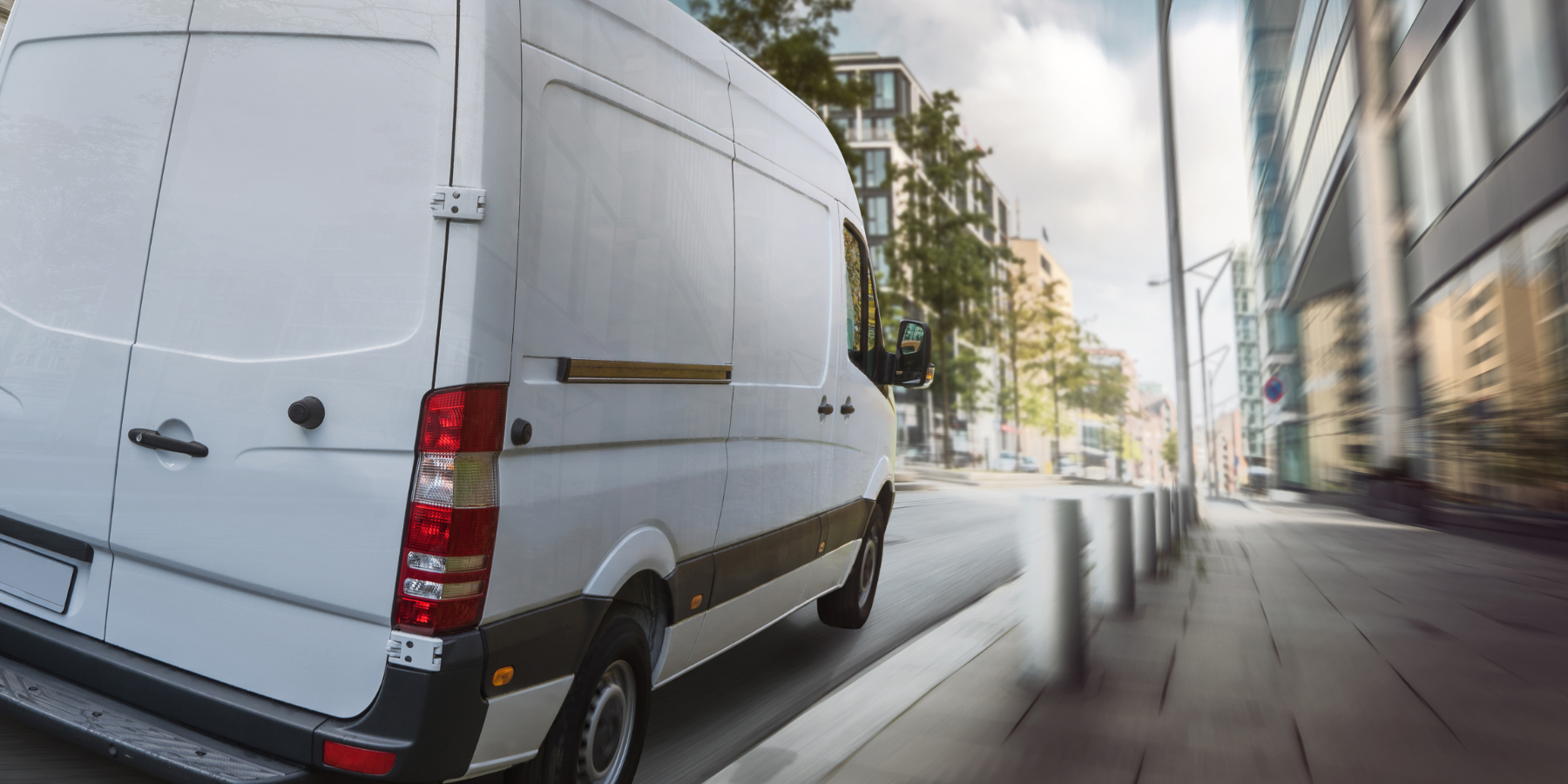 Delivery Van On City Street 1800X900